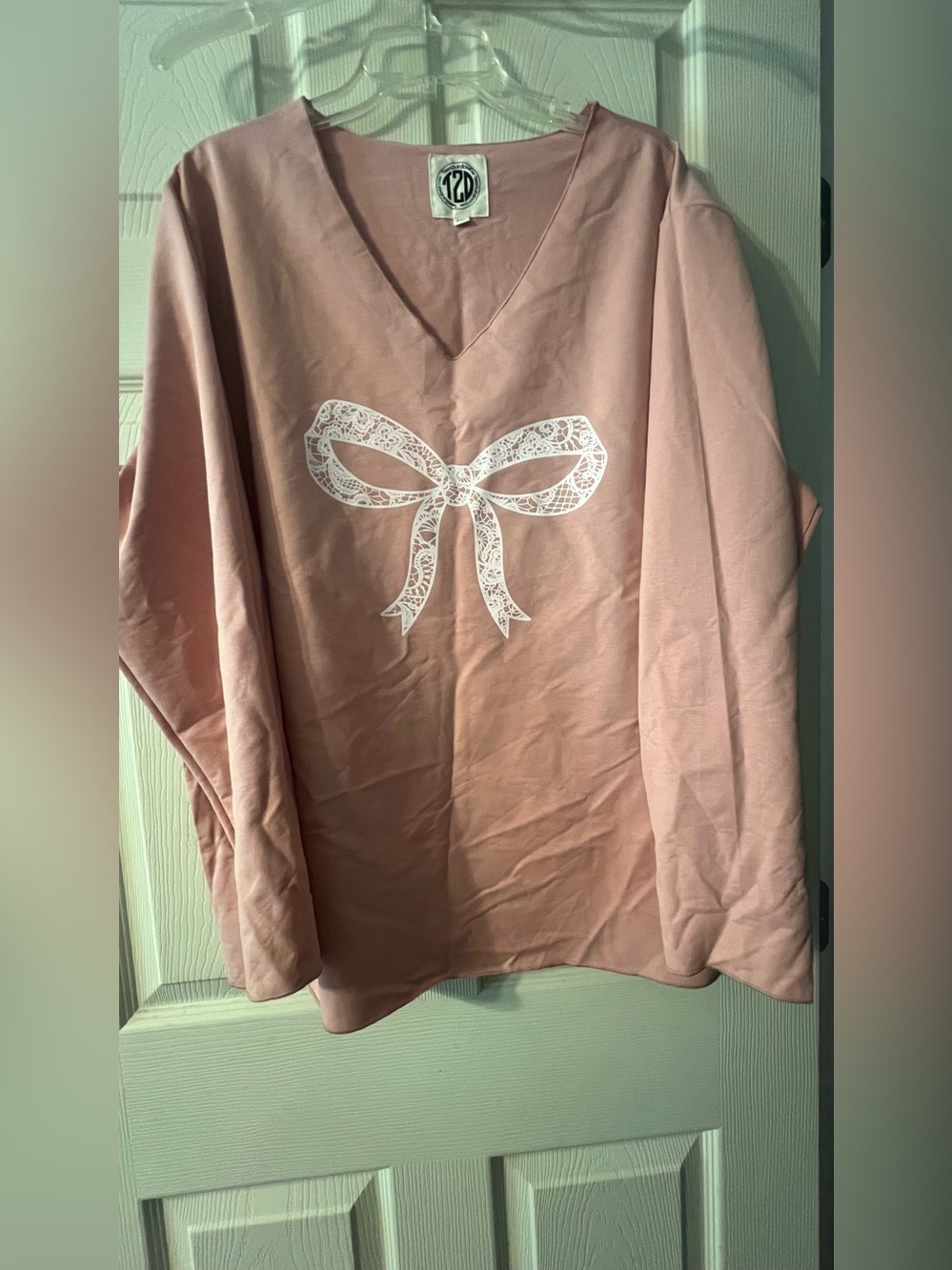 Women's Pink V-Neck Long-Sleeve Top with Decorative Bow